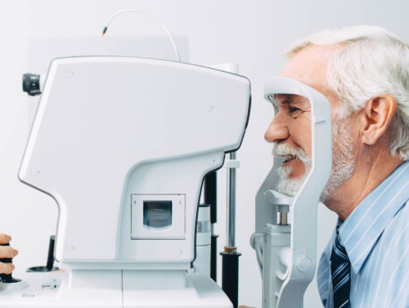 elderly man undergoing amd diagnostic testing