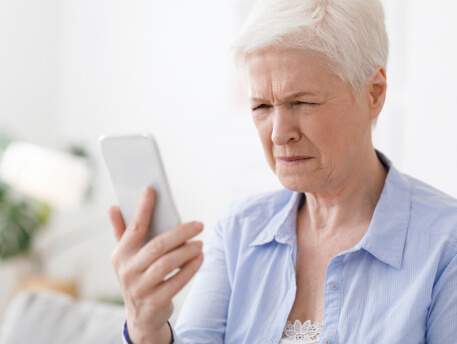 elderly woman suffering from low vision