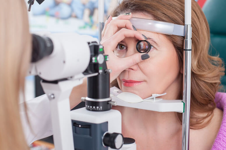 mature woman having her eye exam