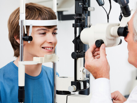 young man taking eye exam